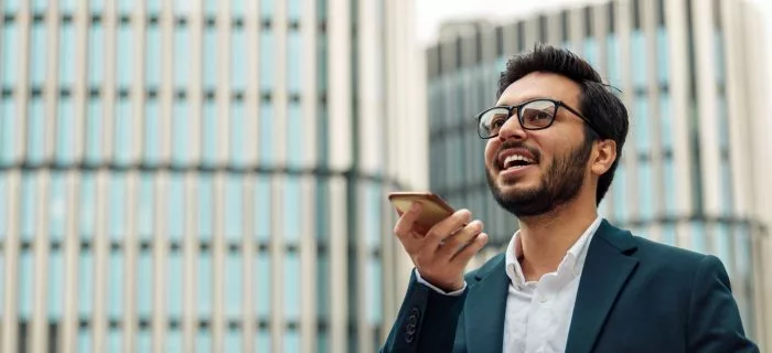 Middle-eastern male using speech recognition to convert audio to text